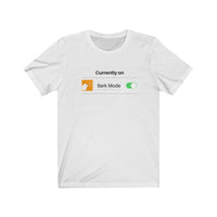 Currently On - Bark Mode Jersey Tee - Image Description - White t-shirt. Currently On is above an orange square showing a white Great Pyrenees barking dog head, with Bark Mode, and then an image of a toggle turned on.