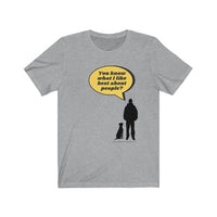 What I like best about people jersey tee - This Athletic Heather crew neck t-shirt front has a silhouette of a dog sitting next to a guy standing with a bright yellow speech bubble  coming from the man. The man says, "You know what I like best about people?"
