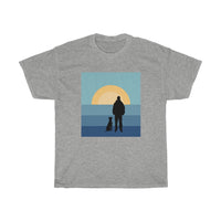 Dog and His Guy Sunset Heavy Cotton Tee - Grey t-shirt with a sitting dog next to a guy looking out at a block blue and yellow sun rise