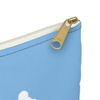 Best Friend Silhouette Clean Mask Organizer - This image highlights a small corner of a light blue bag with a white zipper  with a gold pull and a bit of white print visible in the bottom corner of the image. l