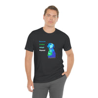 Blue Rescue, Foster, Adopt, Repeat Tee - Image male model wearing the dark grey short sleeve jersey t-shirt with a multi-colored dog (terrier/mutt) head and chest looking up next to words in colors that match the dog - Rescue (blue) Foster (green) Adopt (teal) Repeat (white) 