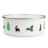 Dogs Holiday Cheer Enamel Bowl - White bowl with stainless steel rim decorated with silhouettes of 2 dogs wearing santa hats standing on either side of a green line Christmas tree with a yellow star and a holly with 3 berries about the same size as the tree.  On the other side of the holly is a silhouette of a sitting dog wearing a santa hat facing a tree that is partially visible.