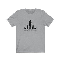 Just One More Dog... Tee - Image Description - Grey Heather t-shirt with black silhouettes of 4 dogs and a woman in the middle above, Just One More Dog.  Dogs include standing pug, sitting boarder collie, sitting mix breed dog and standing dachshund    