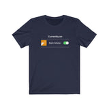 Currently On - Bark Mode Jersey Tee - Navy blue t-shirt. Currently On is above an orange square showing a white barking dog, Bark Mode, and then an image of the toggle turned on.